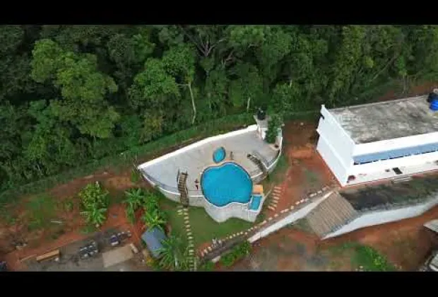 Preview image for the video "Apple Shaped Pool Resort with Vythiri, Wayanad | Swimming Pool Stay &amp; Nature Retreat".